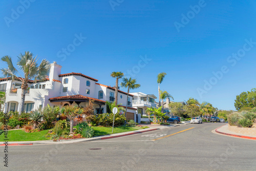 Intersection road in a residential area with mediterranean style houses at San Clemente, California