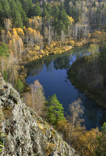 Autumn on the bank of a mountain river