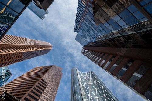 Looking up at skyscrapers in the city of Calgary.