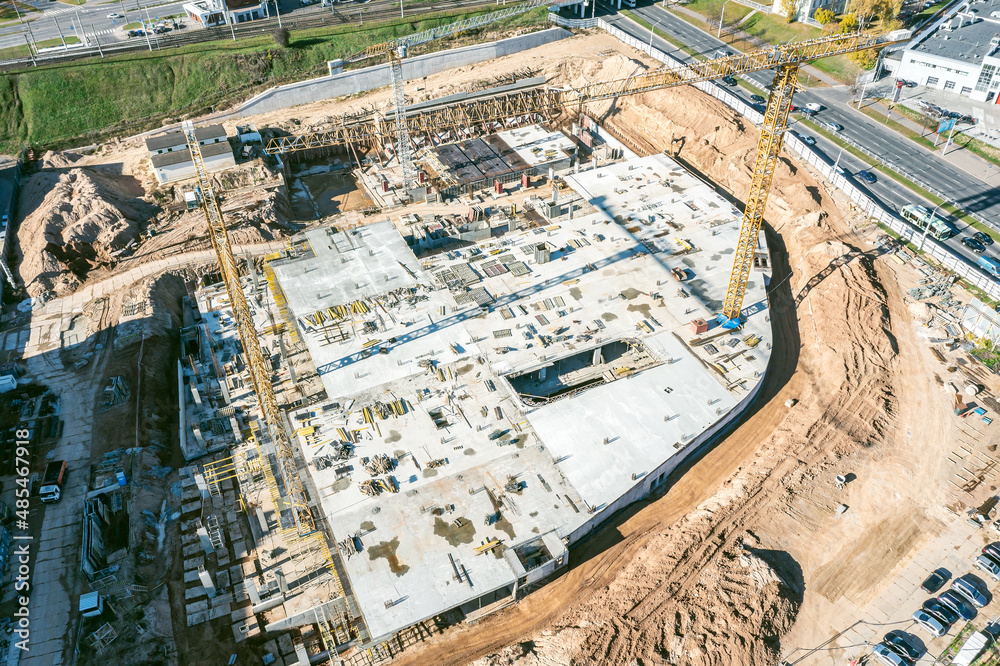 large construction site with working construction cranes. aerial view.