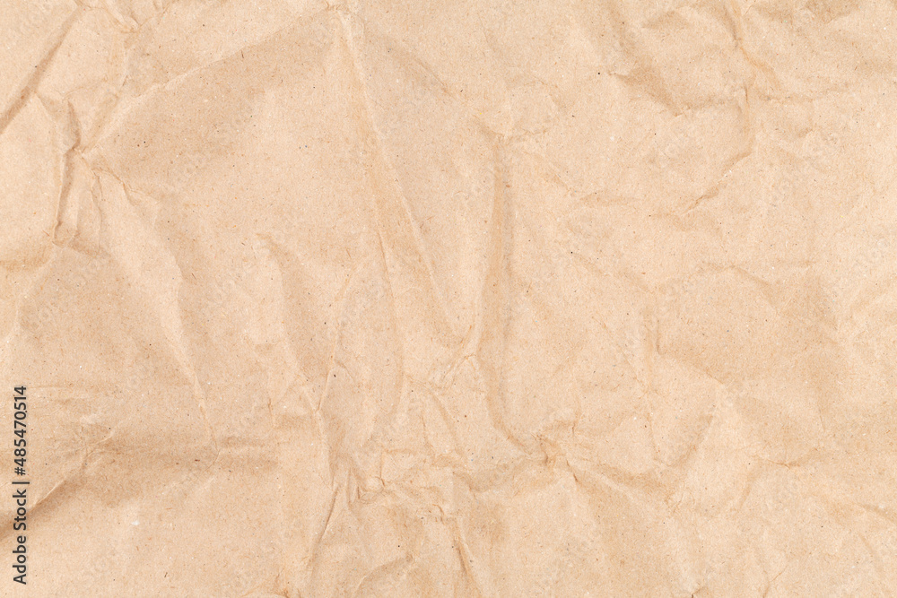 Beige crumpled recycle craft paper texture background. Beige crumpled recycle craft paper texture background.