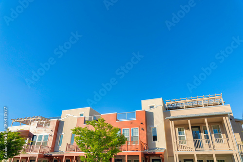 Low angle view of complex buildings at Daybreak, South Jordan, Utah © Jason