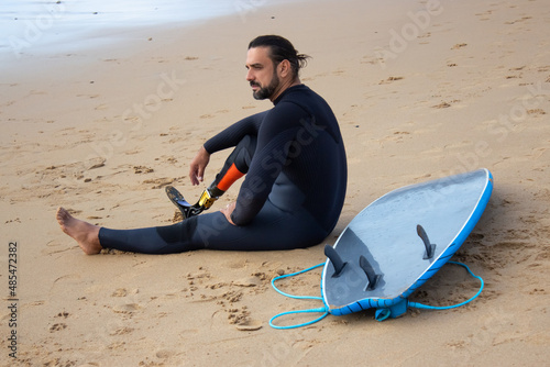 Photography Mid adult man resting after training on beach