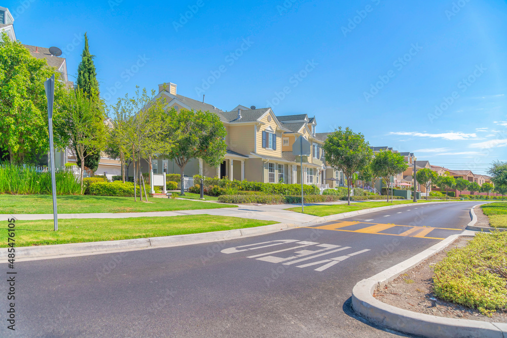 Street road with yeld and pedestrian lanes at Ladera Ranch community in California