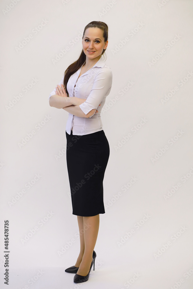 Young beautiful girl in casual clothes. The student prepares for the session. Young beautiful girl in casual clothes. The student prepares for the session.