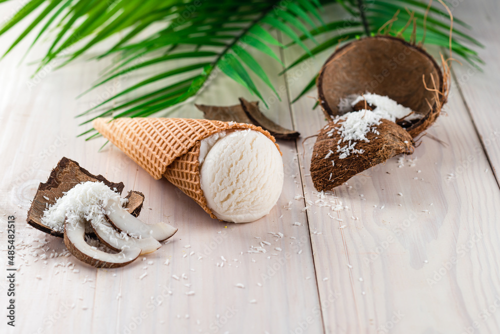 coconut ice cream on a white wooden background