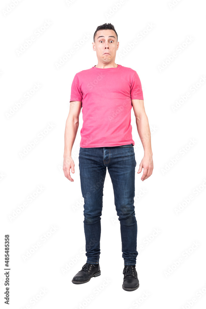 Surprised man in light studio. White background Surprised man in light studio. White background