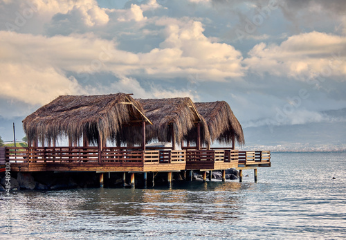 Fototapeta Naklejka Na Ścianę i Meble -  Over water bungalows steps into the sea