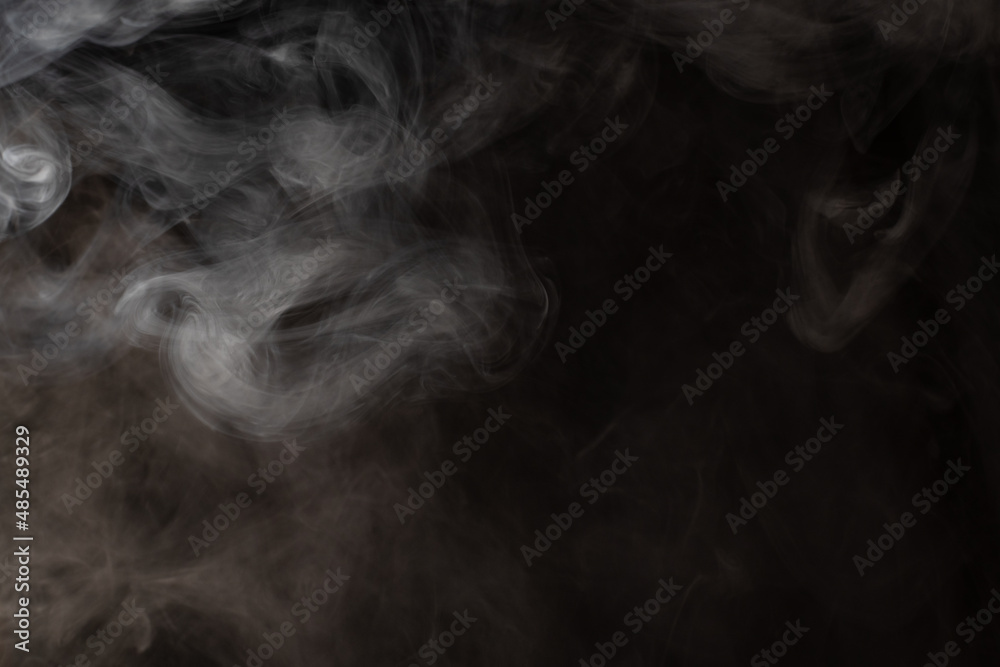 smoke on a black background. puffs of smoke with a gradient. smoke on a black background. puffs of smoke with a gradient.