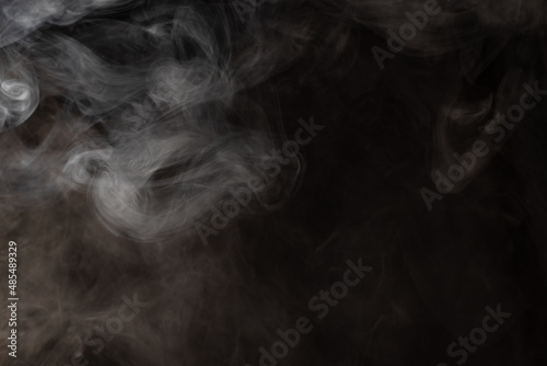 smoke on a black background. puffs of smoke with a gradient.