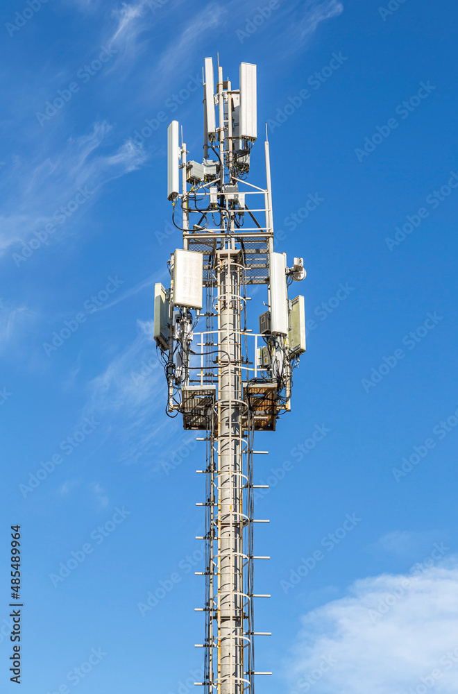 Radio communications tower against a sky