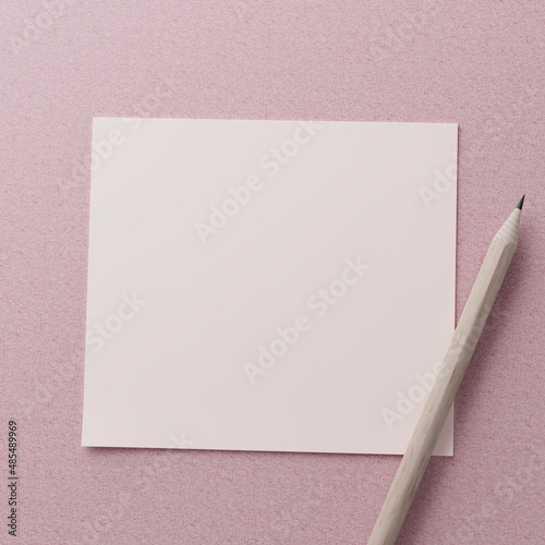 white paper note with pencil