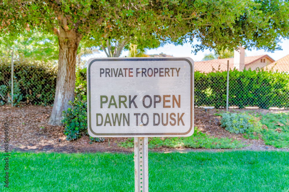 Private property park open dawn to dusk signage in San Diego, California