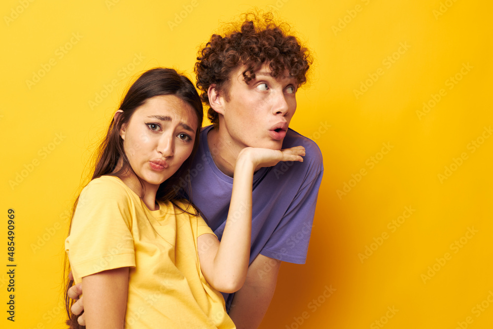 Naklejka premium portrait of a man and a woman casual clothes posing emotions antics Lifestyle unaltered