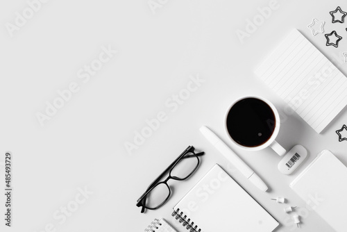 Education flat lay concept with knolling workplace with supplies on white background photo