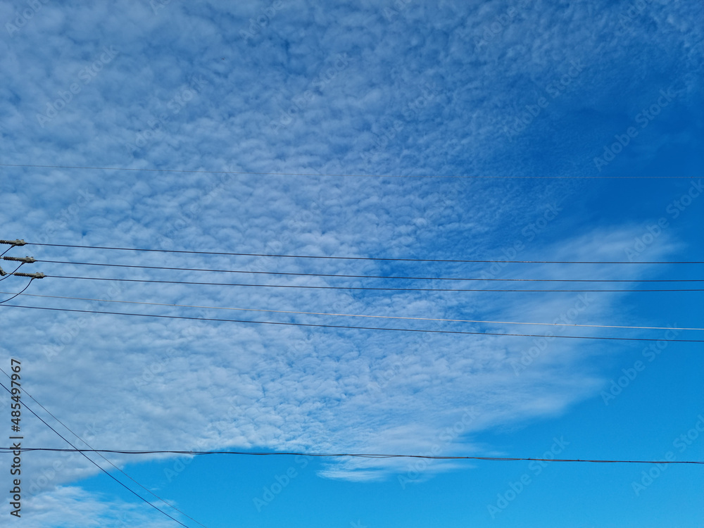 Obraz premium electric line with blue sky background