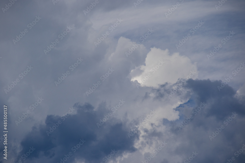 Fototapeta premium Clouds and blue skies the height of the summer season