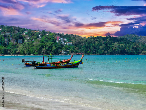 Colourful Sunset Patong Beach lovely vibrant orange, pink and Blue colours Phuket Thailand Thai