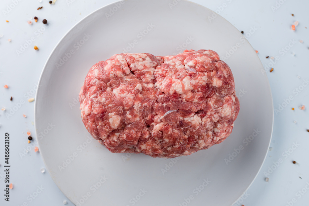 raw minced meat beef on white background