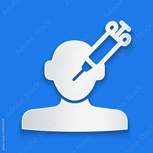 Paper cut Addiction to the drug icon isolated on blue background. Heroin, narcotic, addiction, illegal. Sick junkie with a syringe and medical pills. Paper art style. Vector