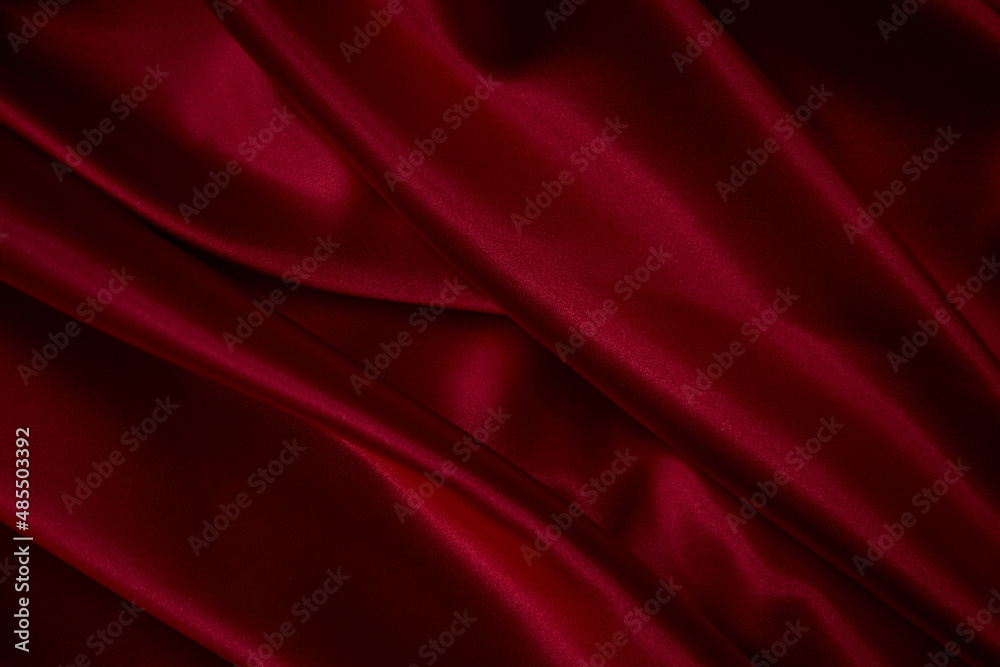 Beautiful draped silk fabric in red.