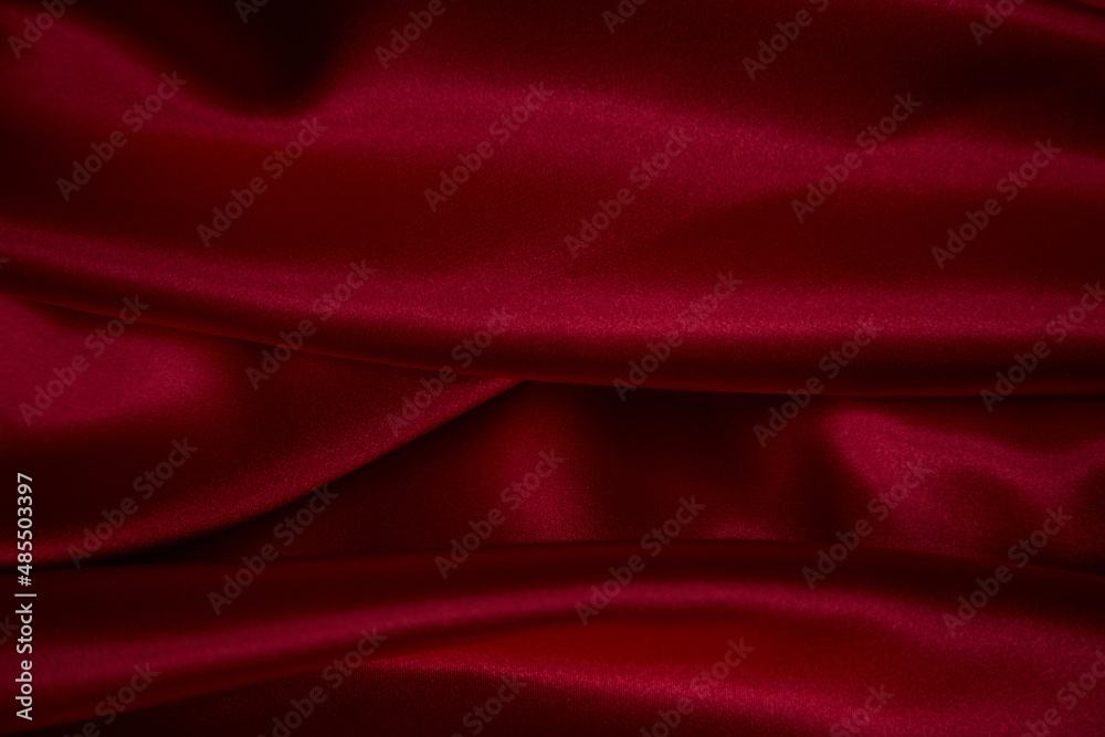 Obraz premium Beautiful draped silk fabric in red.