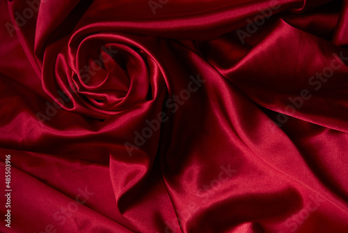 Beautiful draped silk fabric in red.