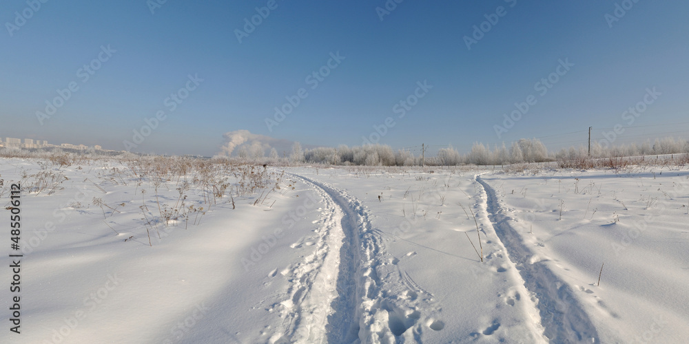 Winter walk through forests and fields, beautiful panorama.