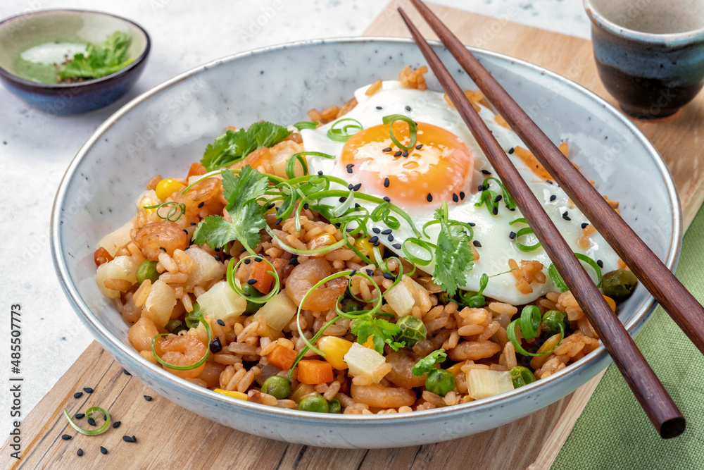 Shrimp fried rice with vegetables and fried egg Shrimp fried rice with vegetables and fried egg