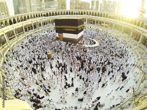 Muslim people praying at Kaaba in Mecca photo