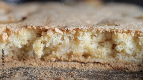 Apple pie on a baking sheet moves smoothly into a clear focus area