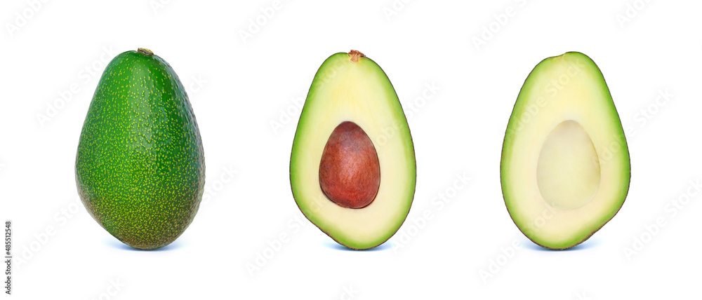 beautiful set of avocado cut in half on a light whitebackground