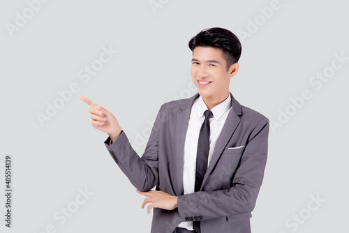 Portrait young asian business man pointing and presenting isolated on white background  advertising and marketing  executive and manager  male confident showing success  expression and emotion.