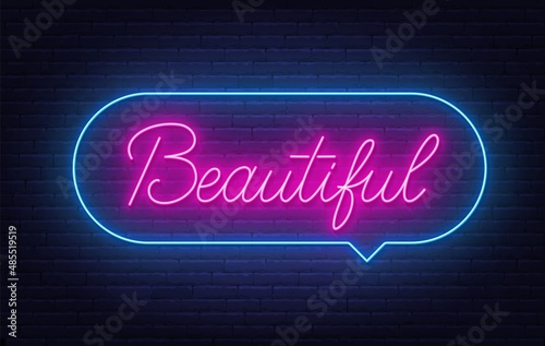 Beautiful neon lettering on brick wall background.