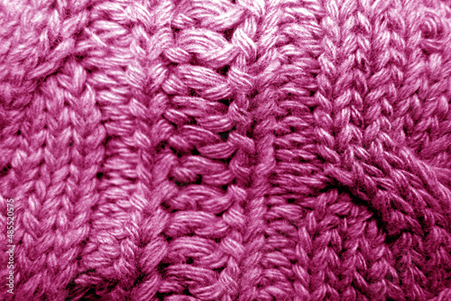 Warm knitting texture in pink tone.