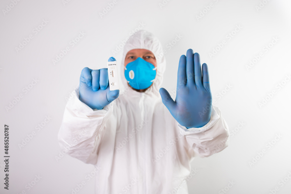 Doctor with laboratory COVID-19 test kit for diagnosis coronavirus infection. Doctor with laboratory COVID-19 test kit for diagnosis coronavirus infection.