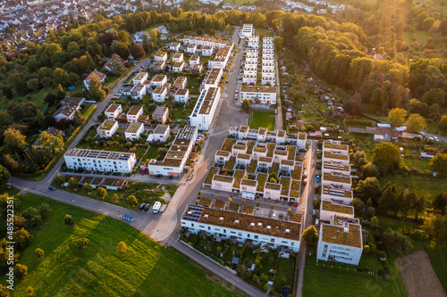 Germany, Baden-Wurttemberg, Esslingen am Neckar, Aerial view of new development area Sonnensiedlung Egert at dusk photo