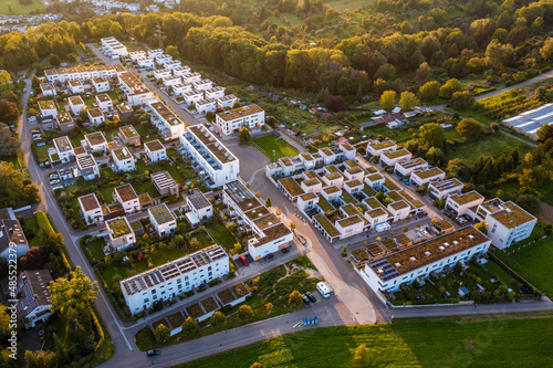 Germany, Baden-Wurttemberg, Esslingen am Neckar, Aerial view of new development area Sonnensiedlung Egert at dusk photo