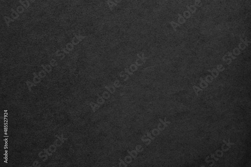 black background, paper texture similar to concrete wall © dmitr1ch