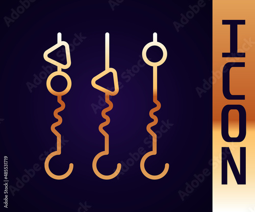 Gold line Grilled shish kebab on skewer stick icon isolated on black background. Meat kebab on skewer stick. Picnic with grilled meat. Vector