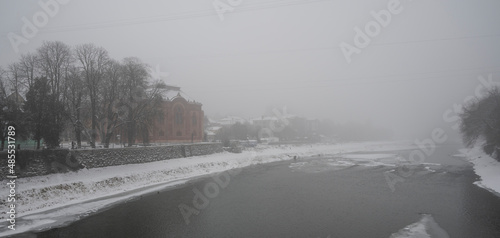 Historic building synagogue in mist in winter in Uzhhorod, Ukraine