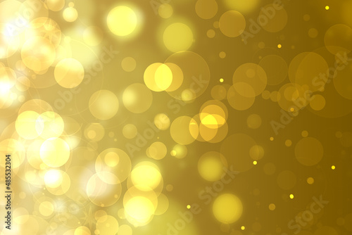 A festive abstract delicate golden yellow orange gradient background texture with glitter defocused sparkle bokeh circles and stars. Card concept for Happy New Year, party invitation, valentine or oth