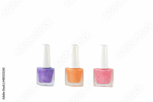 Nail Polish bottles on isolated background, Colored nail varnish.