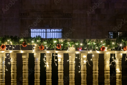 Night view  of the courtyard of the St. Josephs Church, decorated for the celebration of Christmas on the Sderot HaMeginim Street in the Haifa city in northern Israel photo