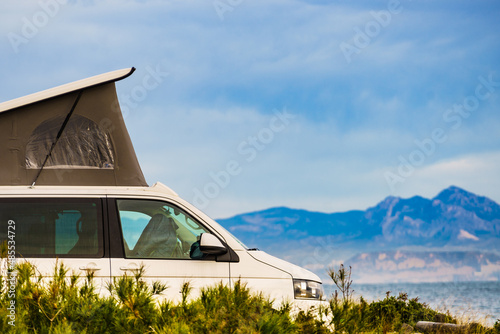 Foto Van camper with tent on roof top camp on nature