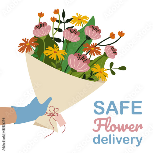 Bouquet of flowers in hand. Safe flower delivery with gloves and mask.