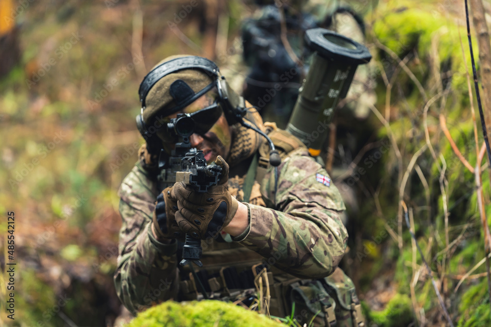 Daring colonel targetting using rifle scoop telescope . High quality photo Daring colonel targetting using rifle scoop telescope . High quality photo