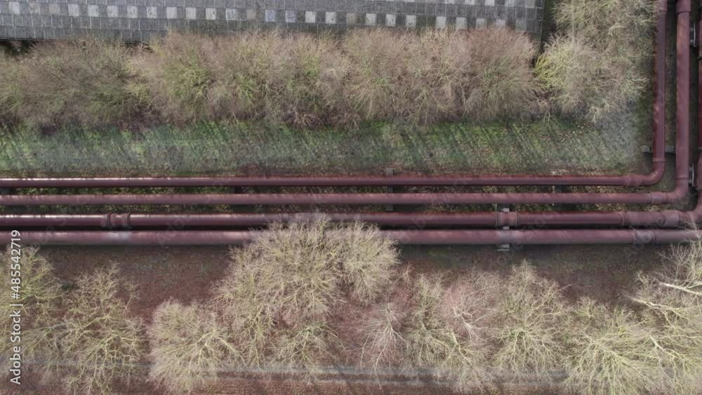 Industrial Cooling, Water Pipes Next to Industry Buildings - Truck Shot Industrial Cooling, Water Pipes Next to Industry Buildings - Truck Shot