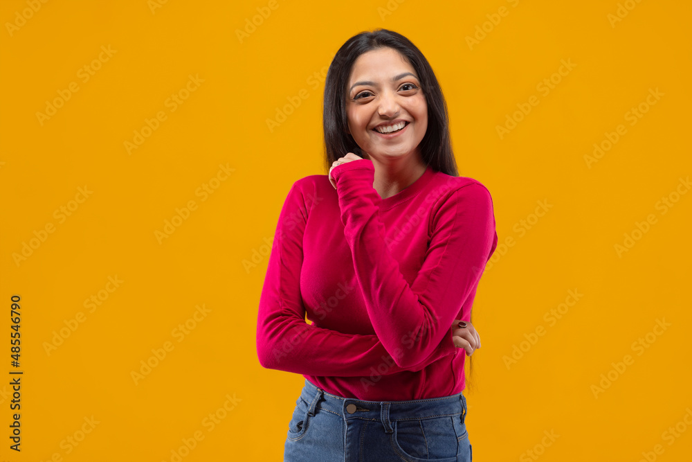 Portrait of a young woman smiling in front of camera Portrait of a young woman smiling in front of camera