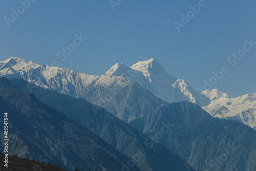 Amazing View to the Snow Capped Mountain Peaks in the Gilgit Baltistan Highlands under the Blue Sky, Pakistan